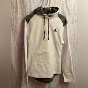 Unisex Adidas golf sweatshirt. Front pockets open bottom